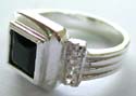 Sterling silver ring with double square pattern holding a square shape black onyx stone in middle, 4 mini clear cz and 3 carved-in line pattern decor on each side