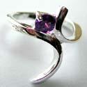Sterling silver ring with curvy stand central design holding a rounded dark purple color amethyst stone in middle