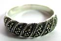 Sterling silver ring with multi marcasite stone inlay wavy pattern design at center