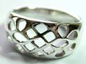 Sterling silver ring with carved-out pattern decor central widen design