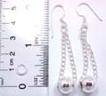 Sterling siver earring with chain-in pearl bead suspended on bottom, fish hook back