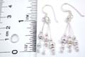 Sterling silver earring with a mini circle holding triple beaded strip dangle, fish hook back