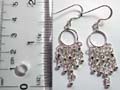 Chandelier earring made of solid 925. sterling silver with circle pattern holding 5 beaded chain dangles on bottom