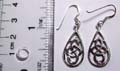 Sterling silver earring in water-drop shape pattern design with carved-out Celtic knot work decor at center