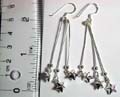 Sterling silver earring with triple beaded strip holding 3 stars on bottom