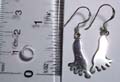 Sterling silver earring with carved-out bare foot pattern design
