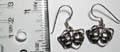 Fish hook back sterling silver earring with carved-out double face pattern design