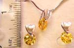 Fashion cz jewelry set with snake chain necklace holding a heart love pattern topped, rounded yellow cz stone pendant, same design stud earring match up
