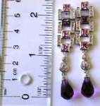 Fashion stud earring with multi mini clear cz and square purple cz forming triple rectangle pattern holding a multi facet purple cz stone on bottom