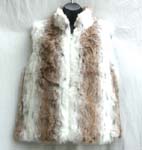 White faux leopa fur jacket with no sleeve; zipper-up front closure; two outer hip pockets and two hidden ones inside