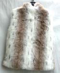 White faux leopa fur jacket with no sleeve; zipper-up front closure; two outer hip pockets and two hidden ones inside