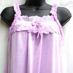 One piece through pajama skirt in purple color; no sleeve; butterfly straps along arm cuffs; lace butterly knot front decor with 1/2" elastic back