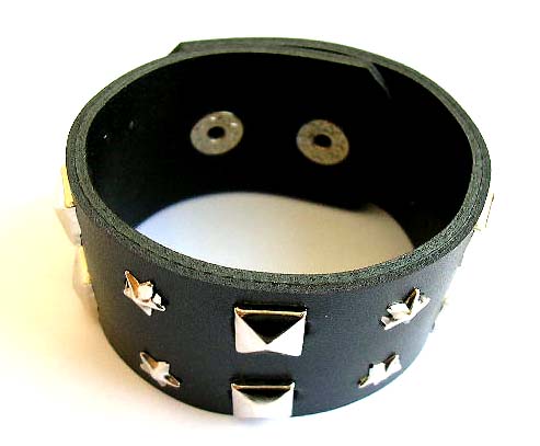 Fashion bracelet in black wide imitation leather band design with multi faceted square and mini star button decor along  