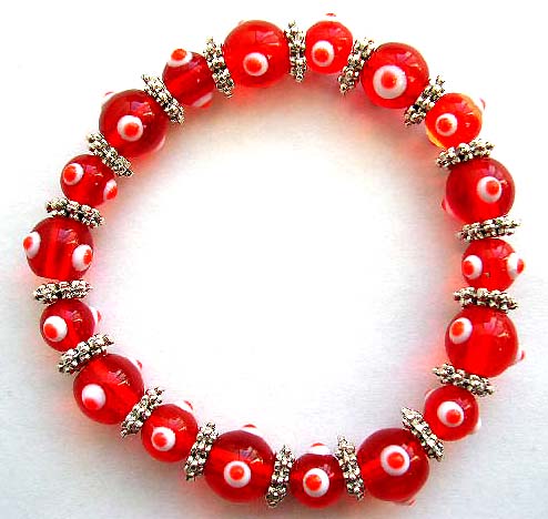 Multi red hand-painted lampwork glass beads ( mystical eye handmade beads ) and flat silver beads forming fashion stretchy bracelet
 
 
