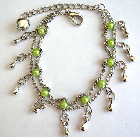 Fashion bracelet in double chain pattern design with multi greenish beads and mini water-drop shape silvery beads inlaid, jiggle bell decor at the end          


 
 
