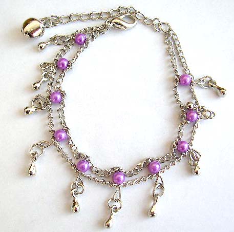 Fashion bracelet in double chain pattern design with multi purple color beads and mini water-drop shape silvery beads inlaid, jiggle bell decor at the end          


 
 

