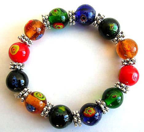 Multi assorted color circular beads and flat silver beads forming fashion stretchy bracelet              


 
 
