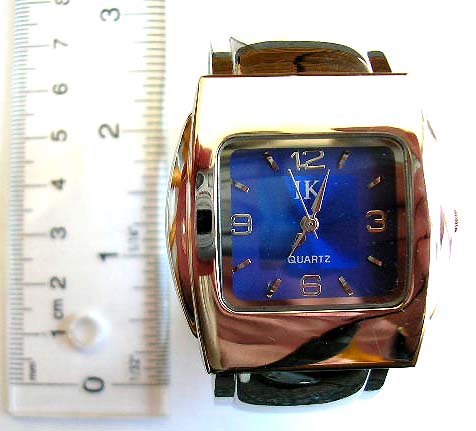 Wide band fashion bangle watch with rectangular clock face design