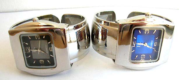Wide band fashion bangle watch with rectangular clock face design
