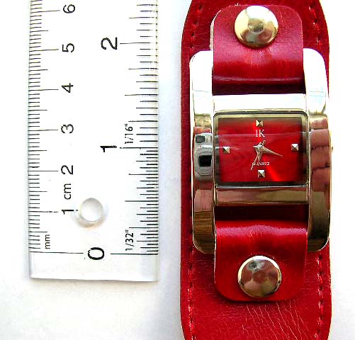Fashion watch with imitation leather band and 2 button decor on band