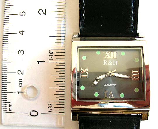Fashion watch with rectangular clock face and widen imitation leather band design