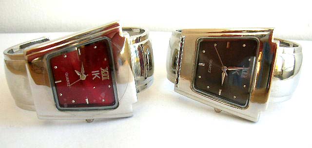 Wide band fashion bangle watch with geometrical clock face design