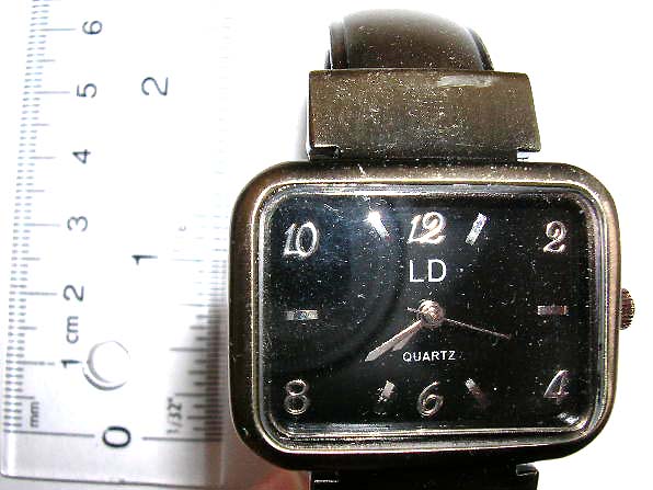 Fashion bronze watch with fat wide rectangular clock face design
