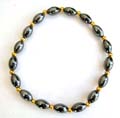 Hematite stretchy bracelet with multi mini golden pearl beads connected olive shape hematite beads inlaid