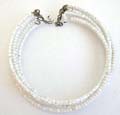 Fashion bracelet bangle in multi white beaded string design