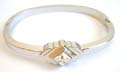 Fashion bangle bracelet with diamond shape clear cz embedded at center