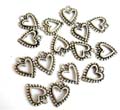 Silver plated charm pendant in dotted heart love pattern design