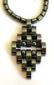 Multi short cylinder shape hematite beads forming fashion hematite necklace with multi curve and pearl beads forming double triangle pendant decor at center 