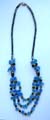 Fashion hematite necklace with multi short cylinder shape hematite beads inlaid and multi blue quartz chips inlaid triple string pendant at center 