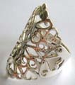 Solid 925. sterling silver ring with carved-out flower shield pattern central design 
