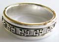 925. sterling silver spinning ring with multi carved-out cross pattern decor around 