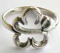 Solid 925. sterling silver ring with carved-out flower pattern central design 
