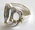 925. sterling silver ring with carved-out patttern central design
