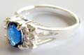 925. sterling silver ring with ovla shape dark blue and multi mini clear cz stone forming butterfly pattern central decor 