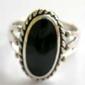 925. sterling silver ring with carved-out triple line pattern holding an edge decor elliptical shape black onyx stone at center
