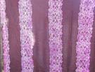 Sarong wrap with linear pattern and purple knot pattern design 