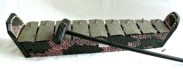 Wooden mini boat shape piano with hammer, Batik dotted pattern decor on side