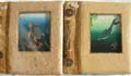 Rectangular handmade photo album with assorted animal cental design and a rope on side, made of natural material such as banana leaf, mulberry papers, recycling papers, etc.
