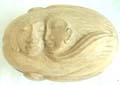 Tropical white hard wood made of loving couple abstract carving