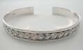 Carved-out braided pattern design sterling silver bangle 