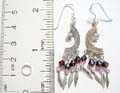 Bali sterling silver fish hook earring with moon shape holding a star and red beads diamond shape dangle at the bottom