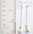 Solid 925. sterling silver earring with a spin and star holding on bottom 