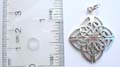 Cut-out Celtic knot design sterling silver pendant.