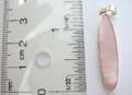 Long oval shape pattern sterling silve pendant with pink mother of pearl seashell inlay.