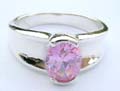 Wide band sterling silver ring with cut face oval shape rose cz at the center 