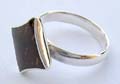 Sterling silver ring with diamond shape embedded coconut shell wood  in the center